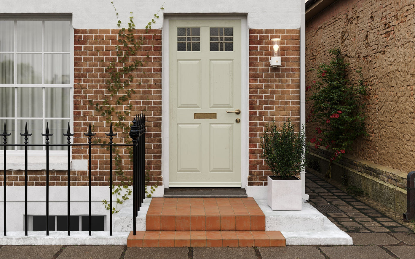 Tala Muse Wall Light in candlenut finish, styled in a modern UK interior to highlight sustainable and sculptural lighting design trends for 2025.