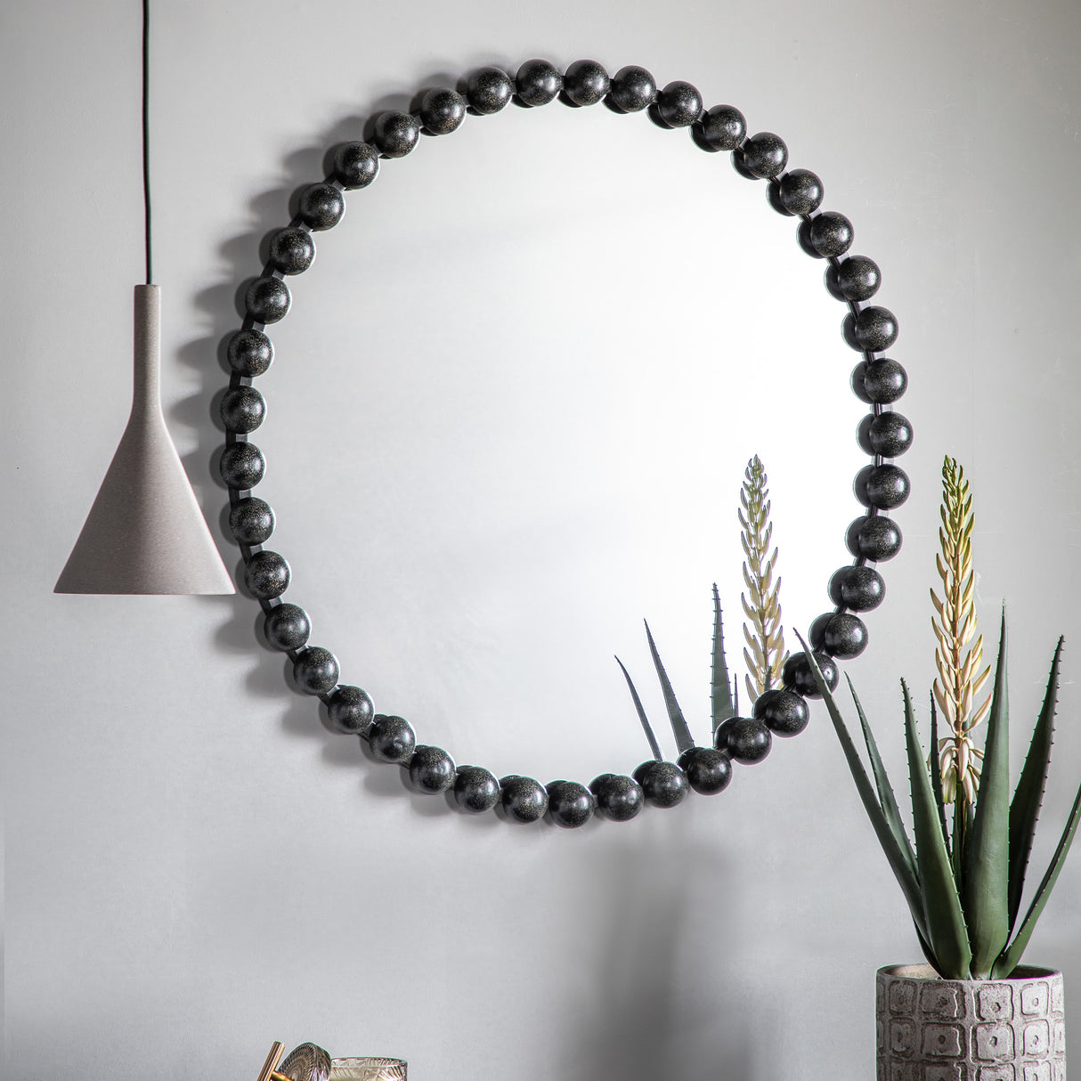 Amos Aged black round mirror – from Amos Lighting + Home
