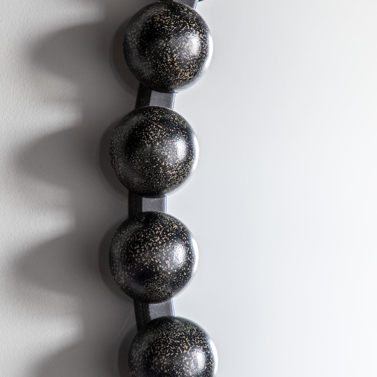 Amos Aged black round mirror – from Amos Lighting + Home