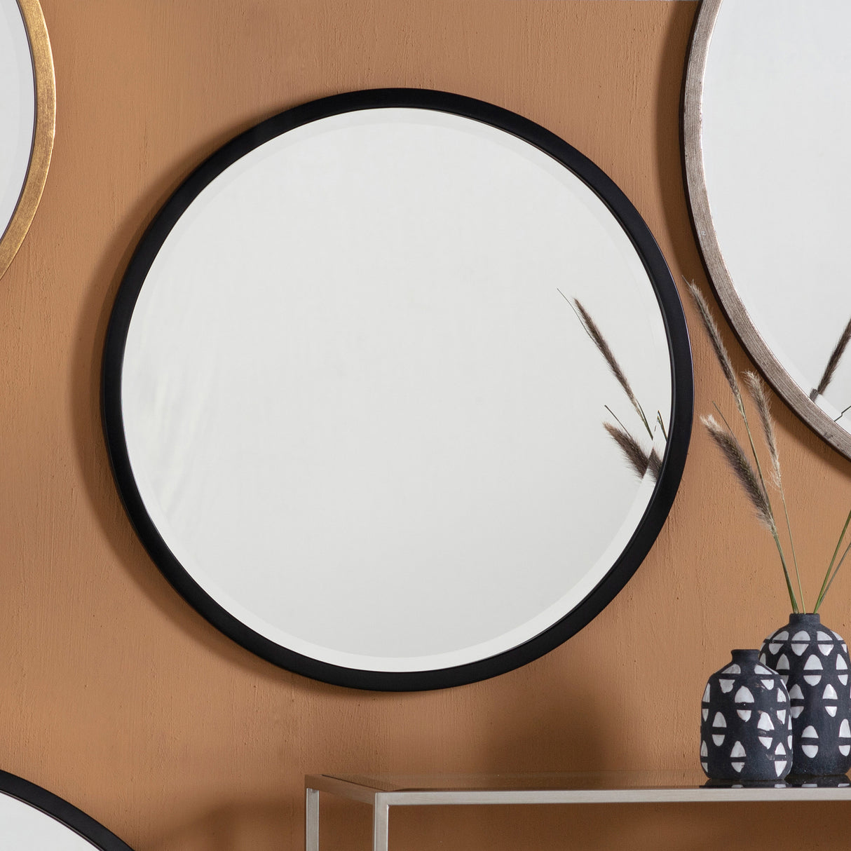 Amos Aged black medium round mirror – from Amos Lighting + Home