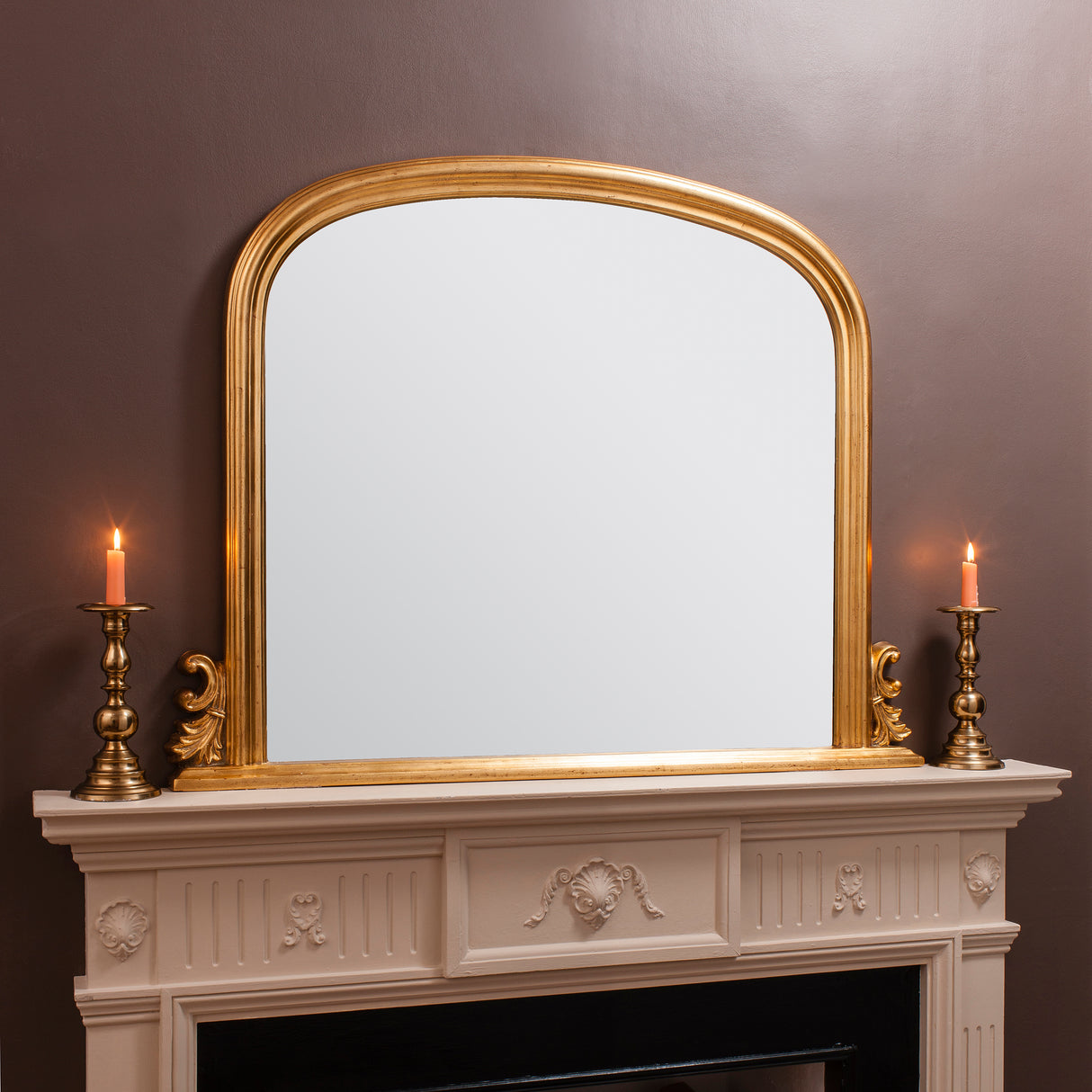 Amos Gold leaf arch over mantel mirror – from Amos Lighting + Home