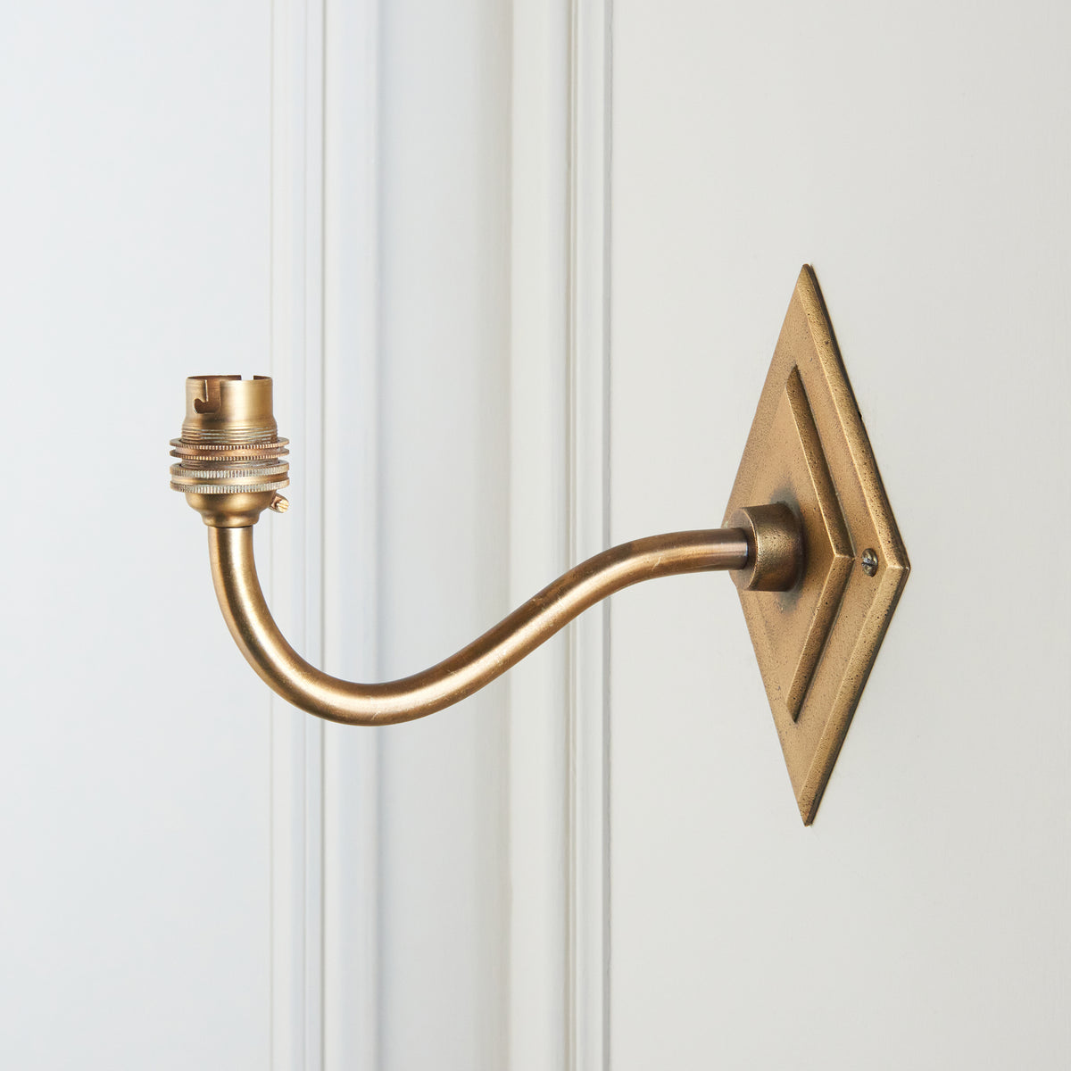 Endon Diamond Curve Wall Bracket Antique brass plate