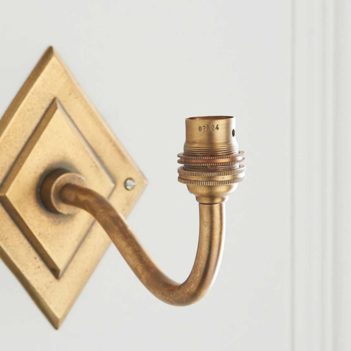 Endon Diamond Curve Wall Bracket Antique brass plate