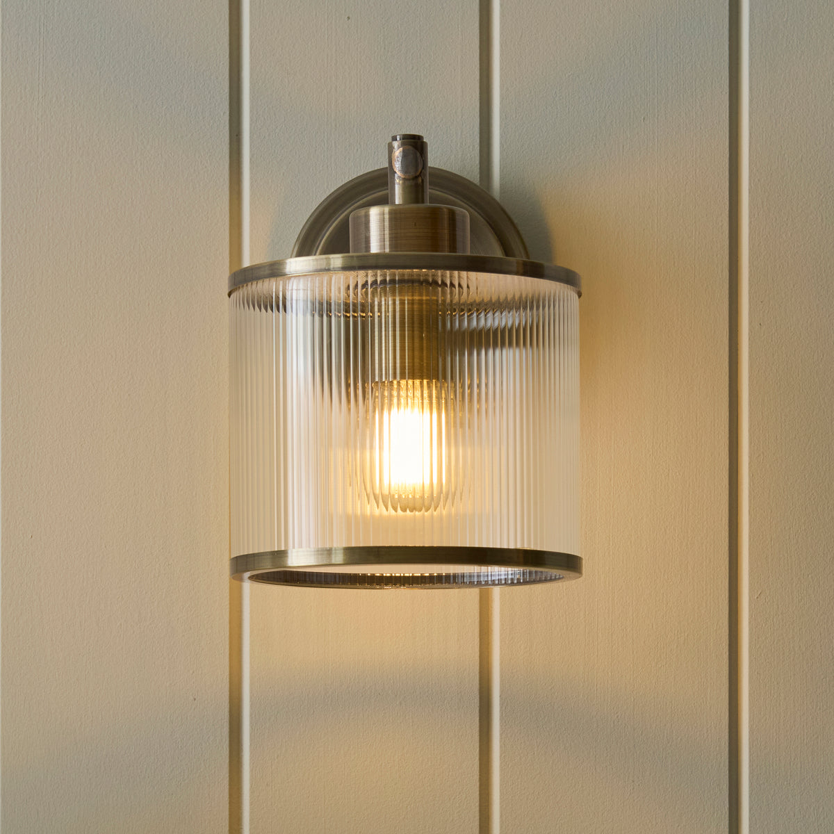 Endon Ridgeton Armed Wall Antique brass plate & clear ribbed glass