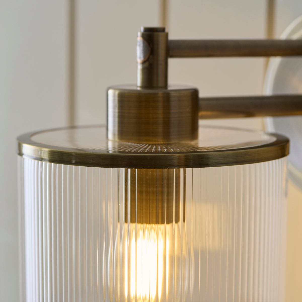 Endon Ridgeton Armed Wall Antique brass plate & clear ribbed glass