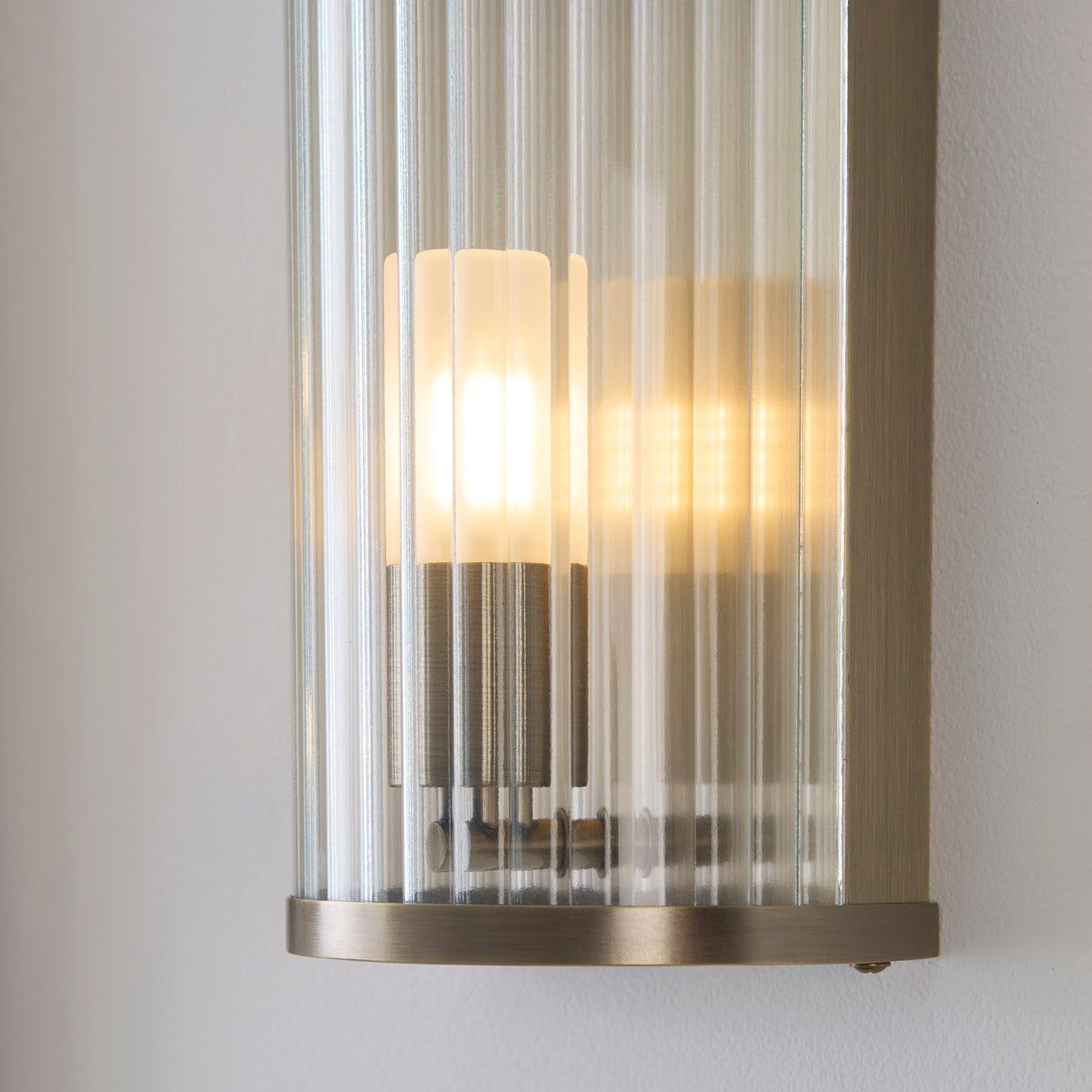 Endon Ridgeton IP44 Wall Antique brass plate & clear ribbed glass