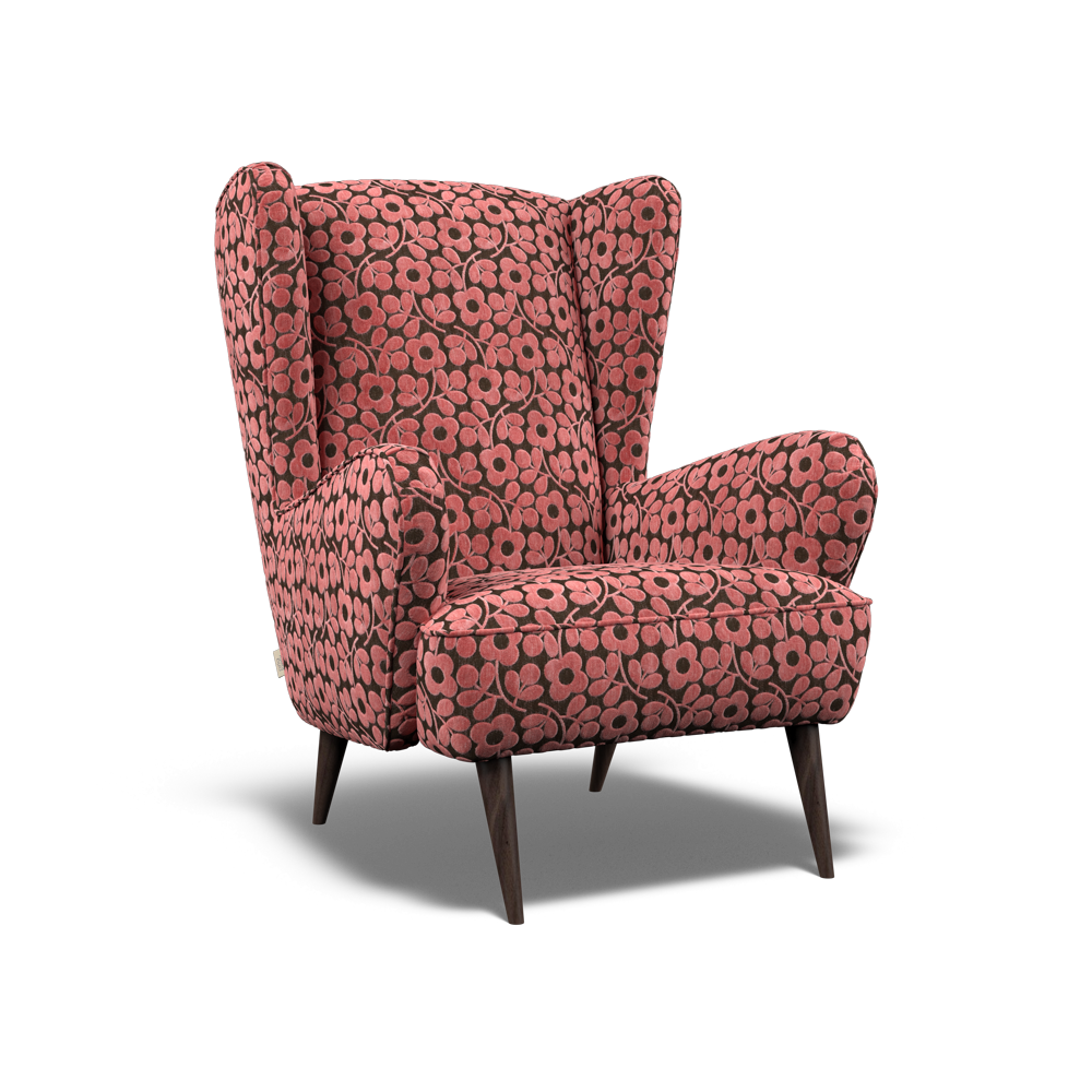 Alma armchair with blush pink floral upholstery and walnut tapered wooden legs