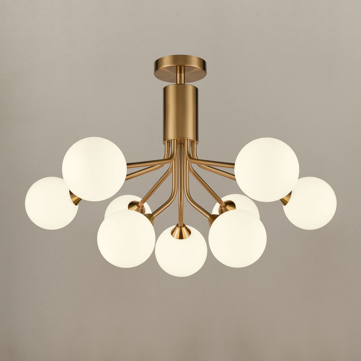 Franklite Cosmic 9 light pendant in antique gold with matt opal glass