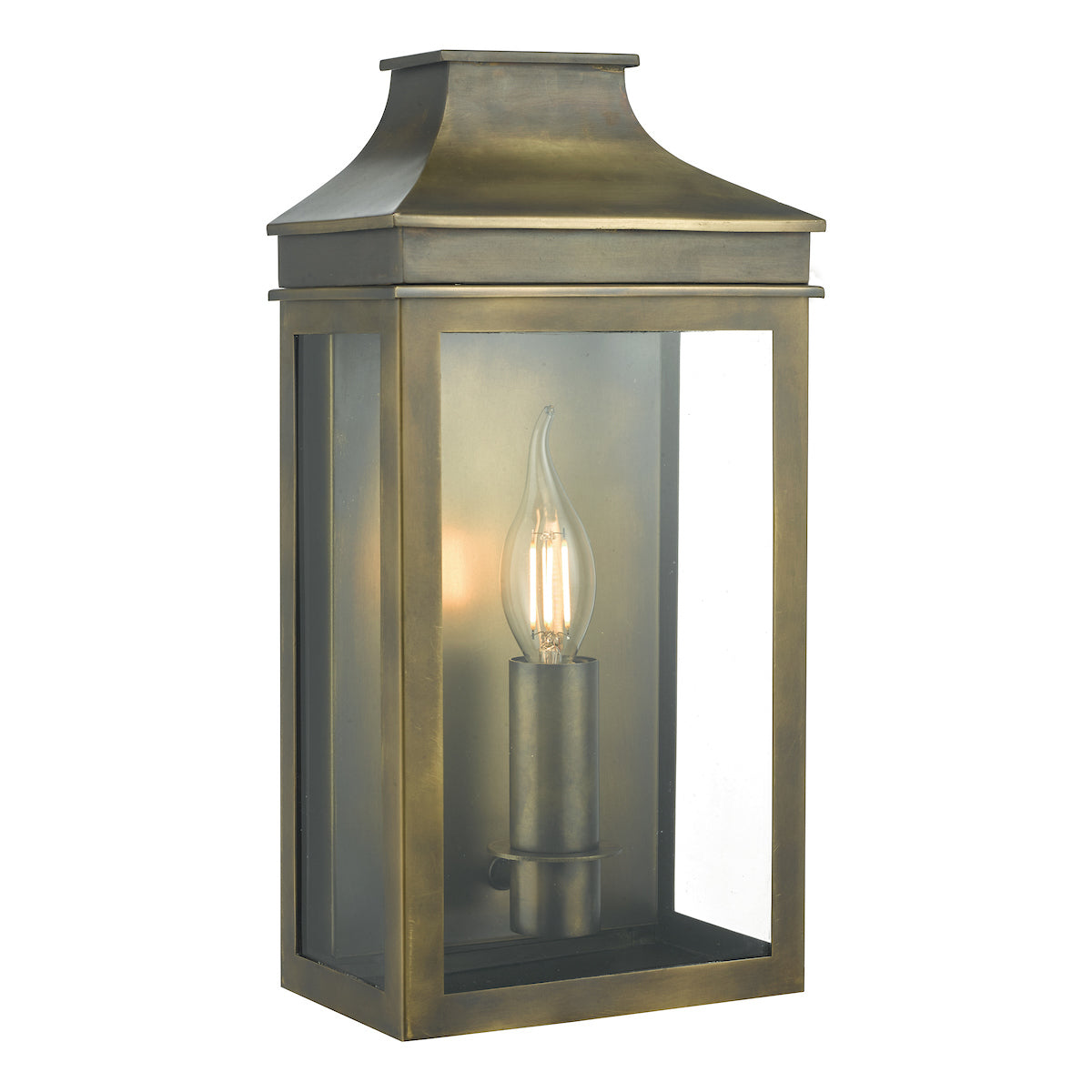 weathered brass wall coach lantern with clear glass panels and candle-style LED bulb