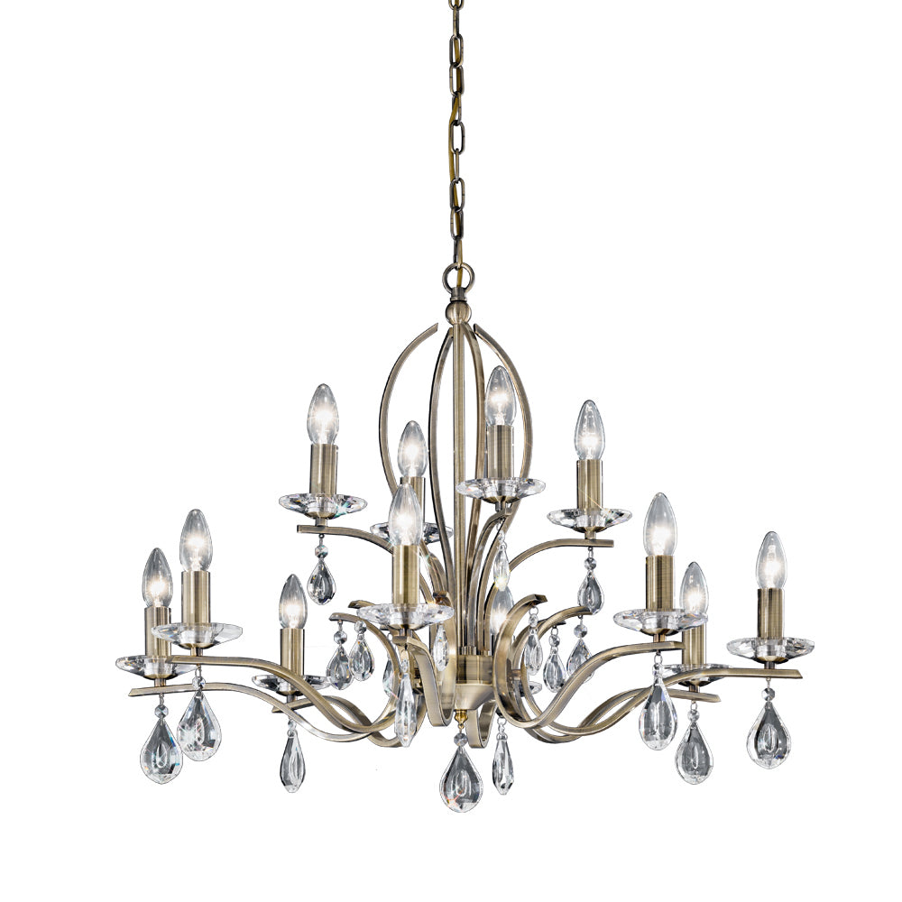 Elegant vintage brass chandelier with ten candle-style lights and crystal teardrop pendants