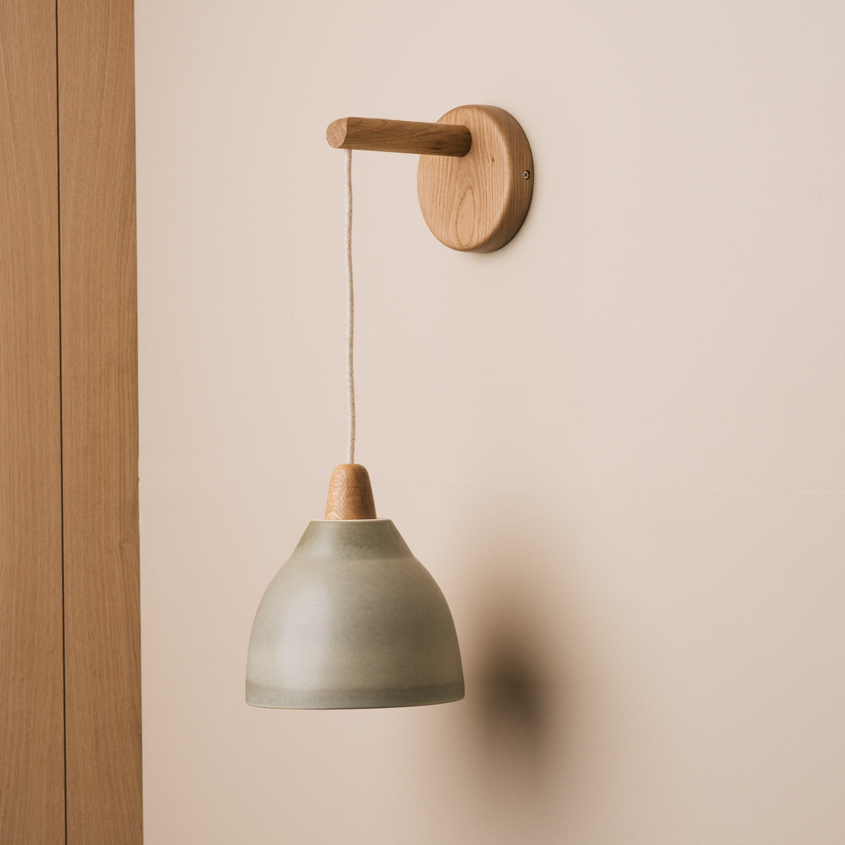 Studio Haran Element Hanging Wall Light in Ceramic and Oak