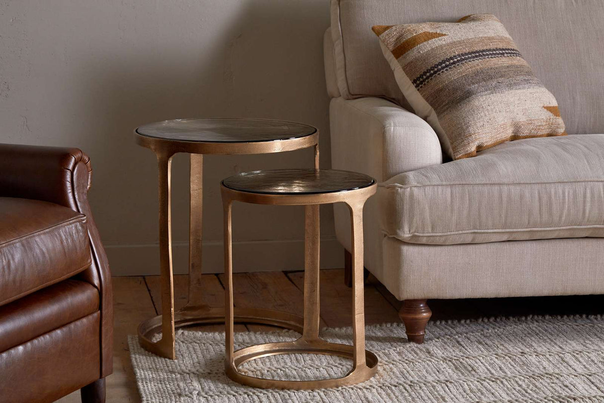 Nkuku Khidki Cast Metal & Glass Nesting Side Tables Antique Brass (Set of 2)