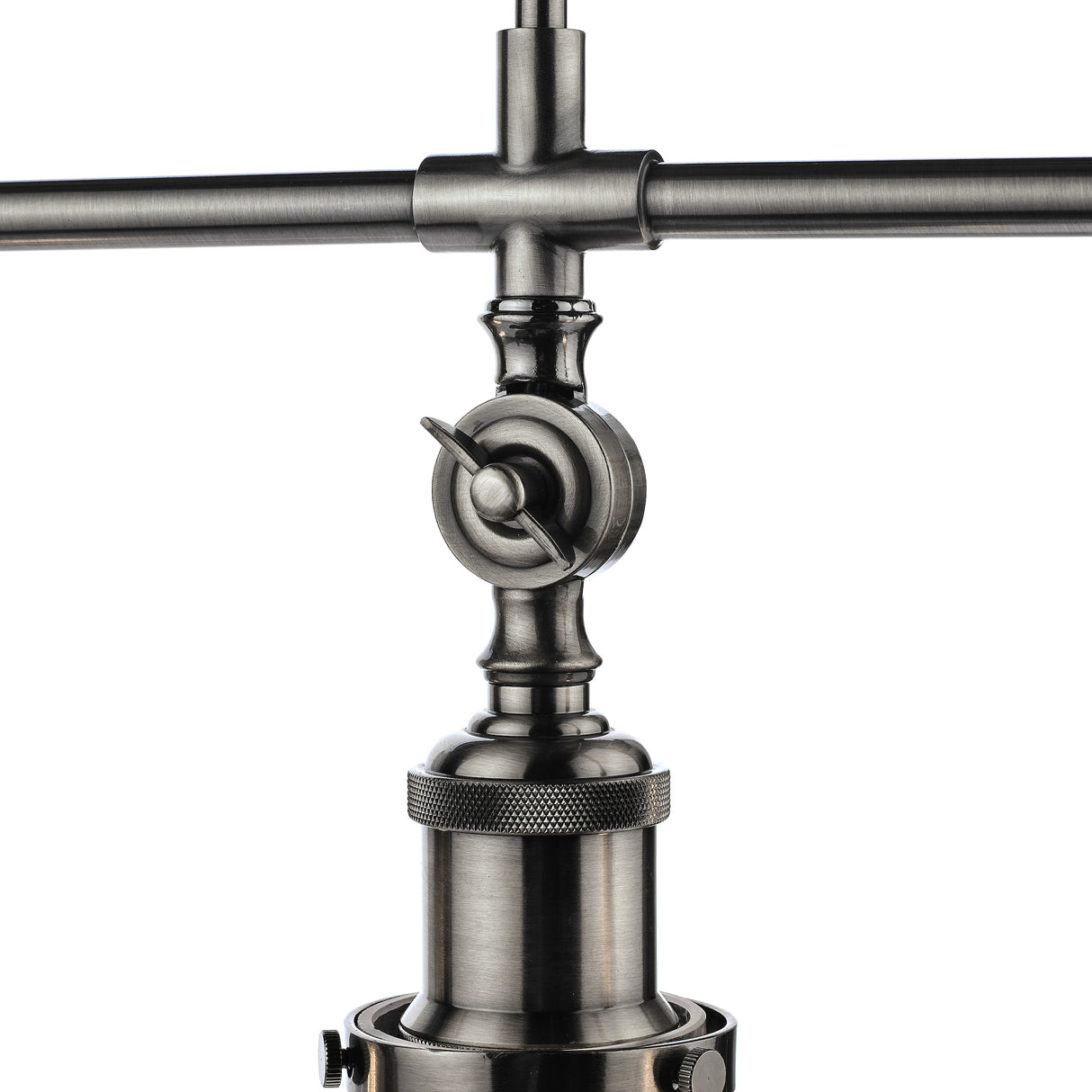 Close-up of industrial-style metallic pipe fitting with valve handle and textured grip