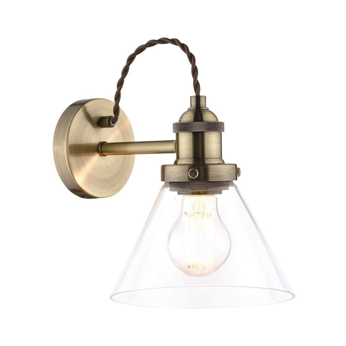 Vintage brass wall sconce with clear glass shade and exposed filament bulb