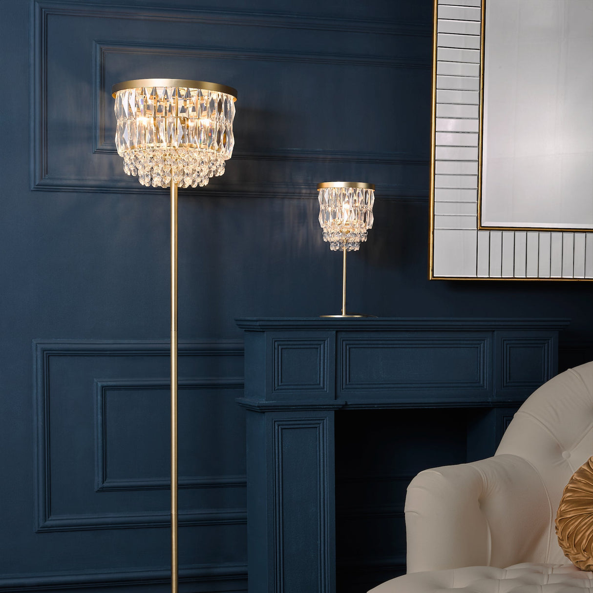 Elegant crystal floor lamp and table lamp with gold accents in navy blue living room
