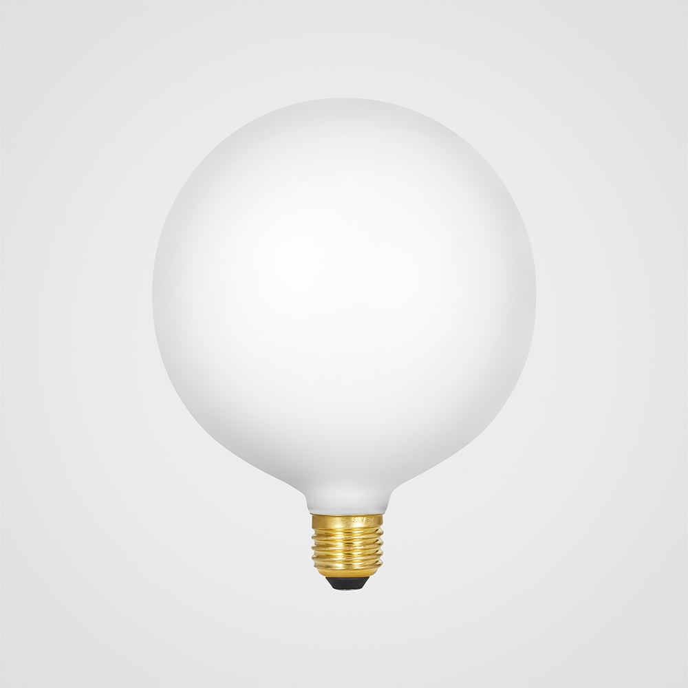 Tala G150 frosted globe LED light bulb with E27 brass base on white background