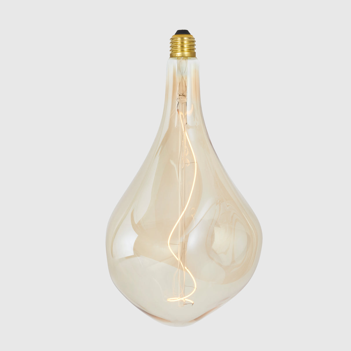 Tala Voronoi III decorative vintage light bulb with golden filament on grey background