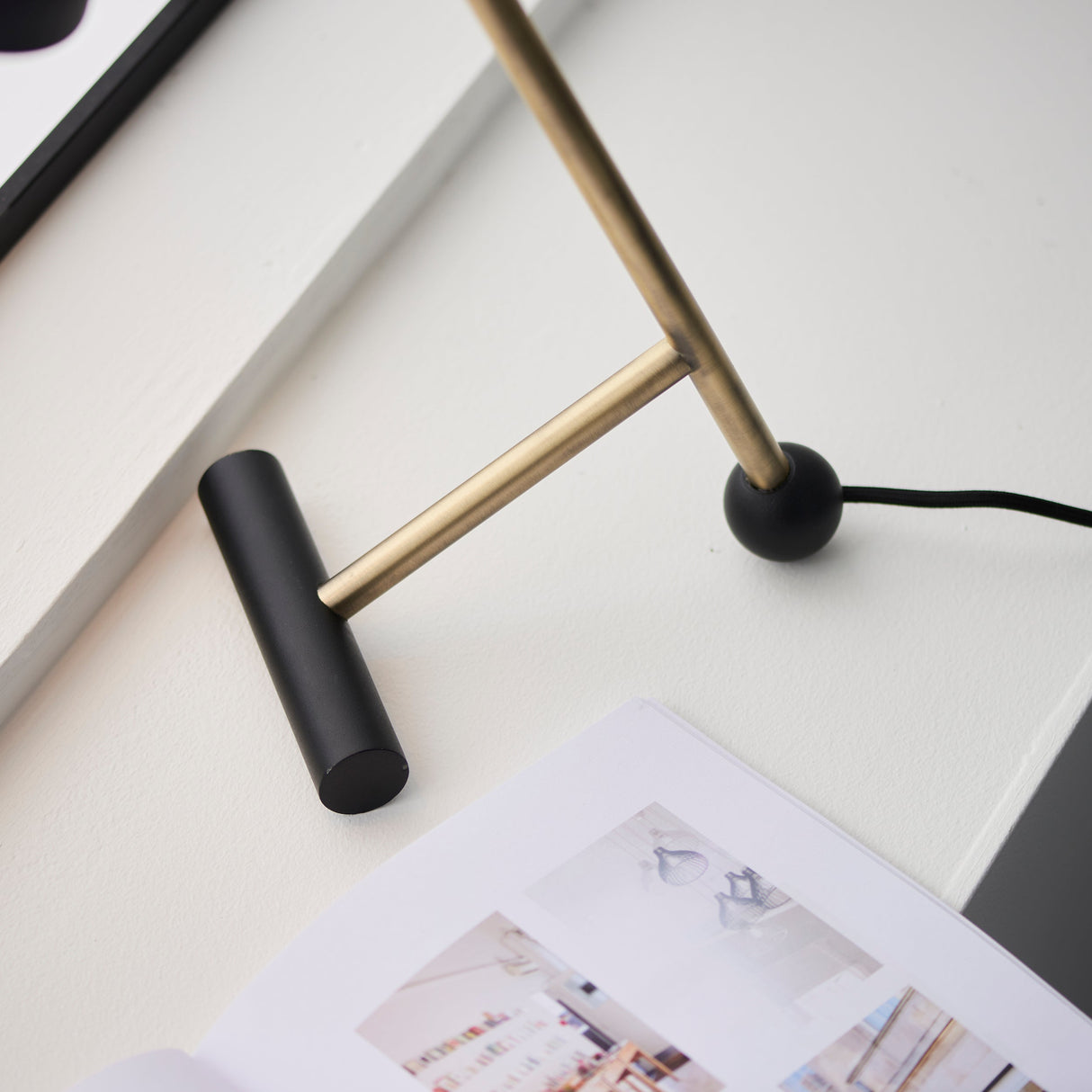 Amos Bachelor Table Lamp Antique Brass & Black – from Amos Lighting + Home