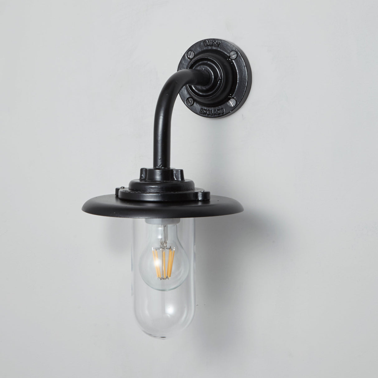 Davey Lighting Black Iron Exterior Round Neck Wall Light 7677, Clear Glass – from Amos Lighting + Home
