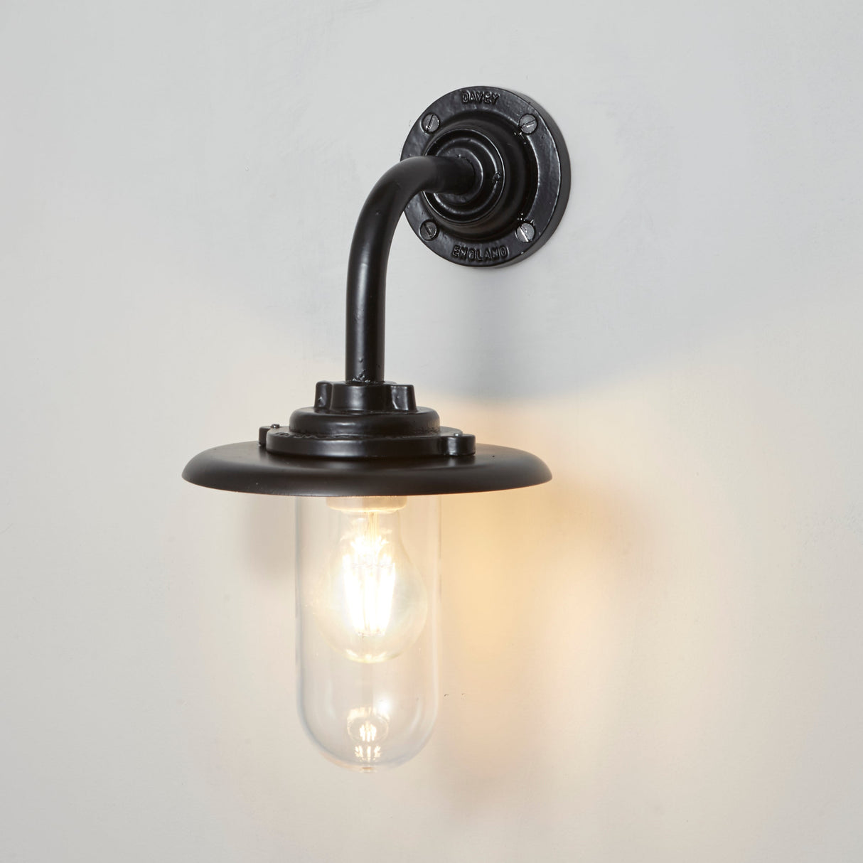 Davey Lighting Black Iron Exterior Round Neck Wall Light 7677, Clear Glass – from Amos Lighting + Home