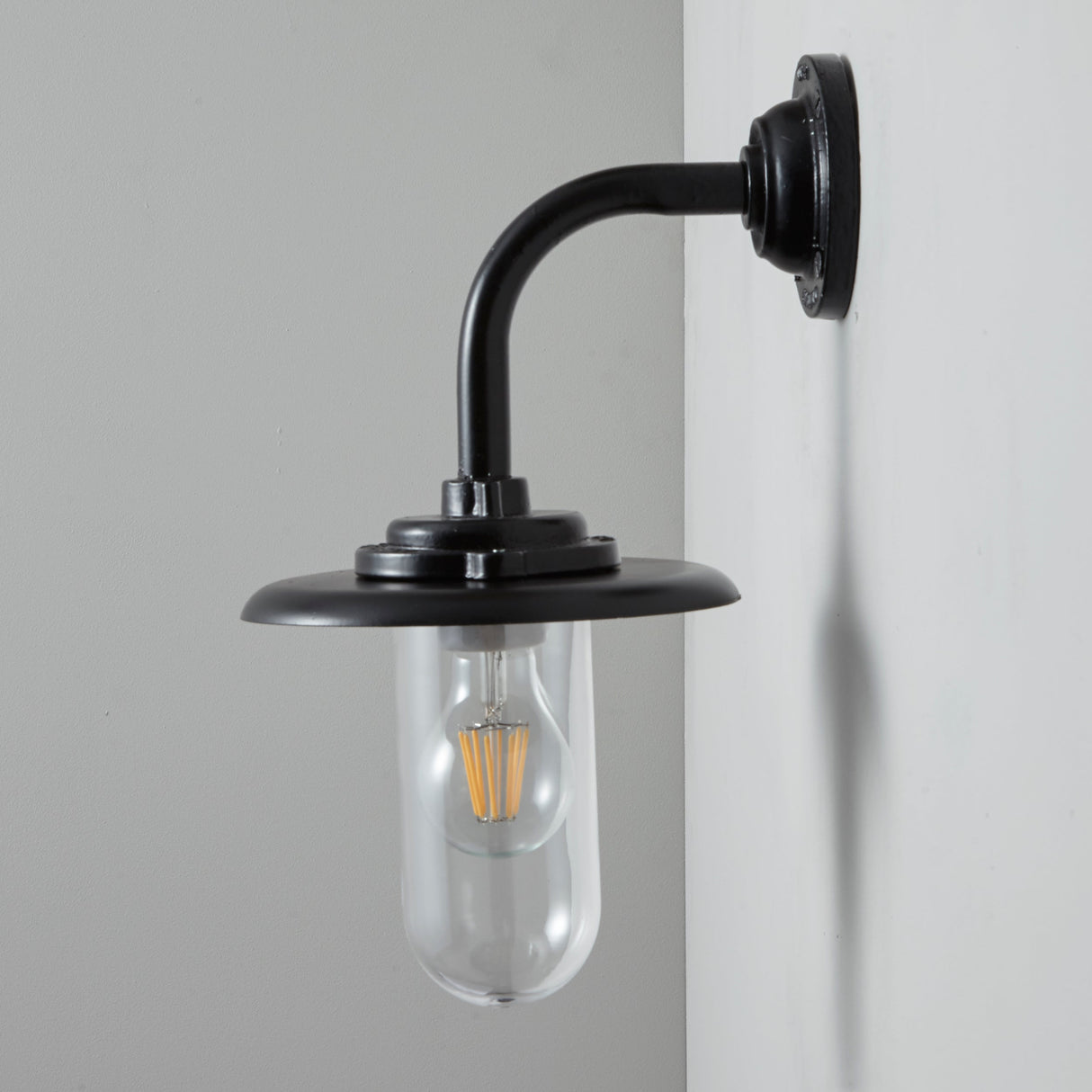 Davey Lighting Black Iron Exterior Round Neck Wall Light 7677, Clear Glass – from Amos Lighting + Home