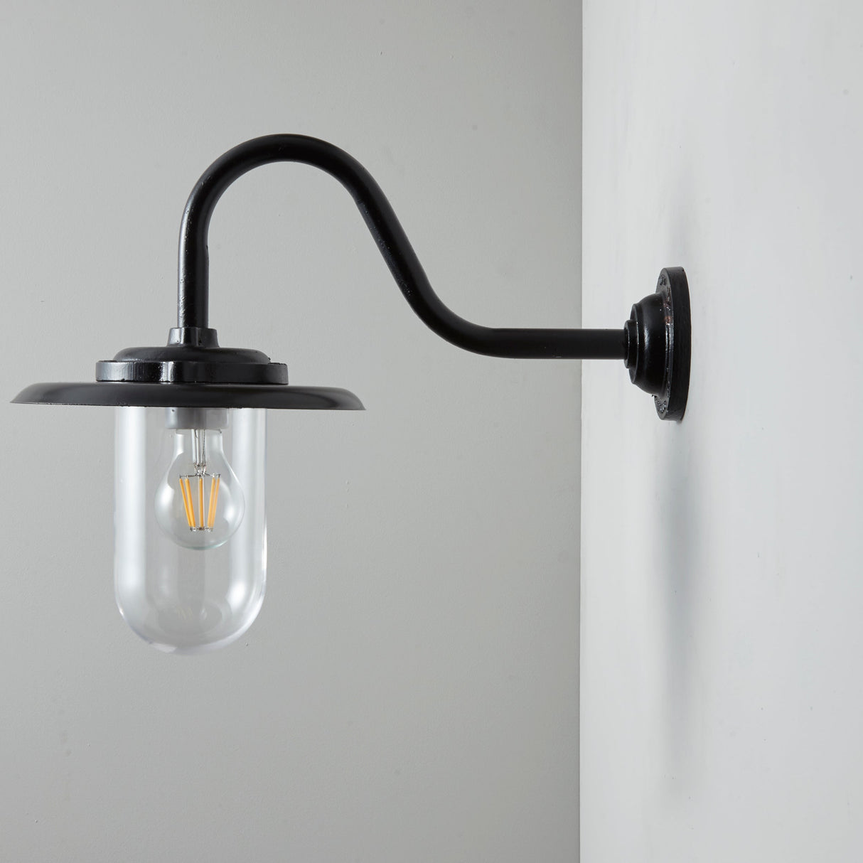 Davey Lighting Black Iron Exterior Swan Neck Wall Light 7677, Clear Glass – from Amos Lighting + Home