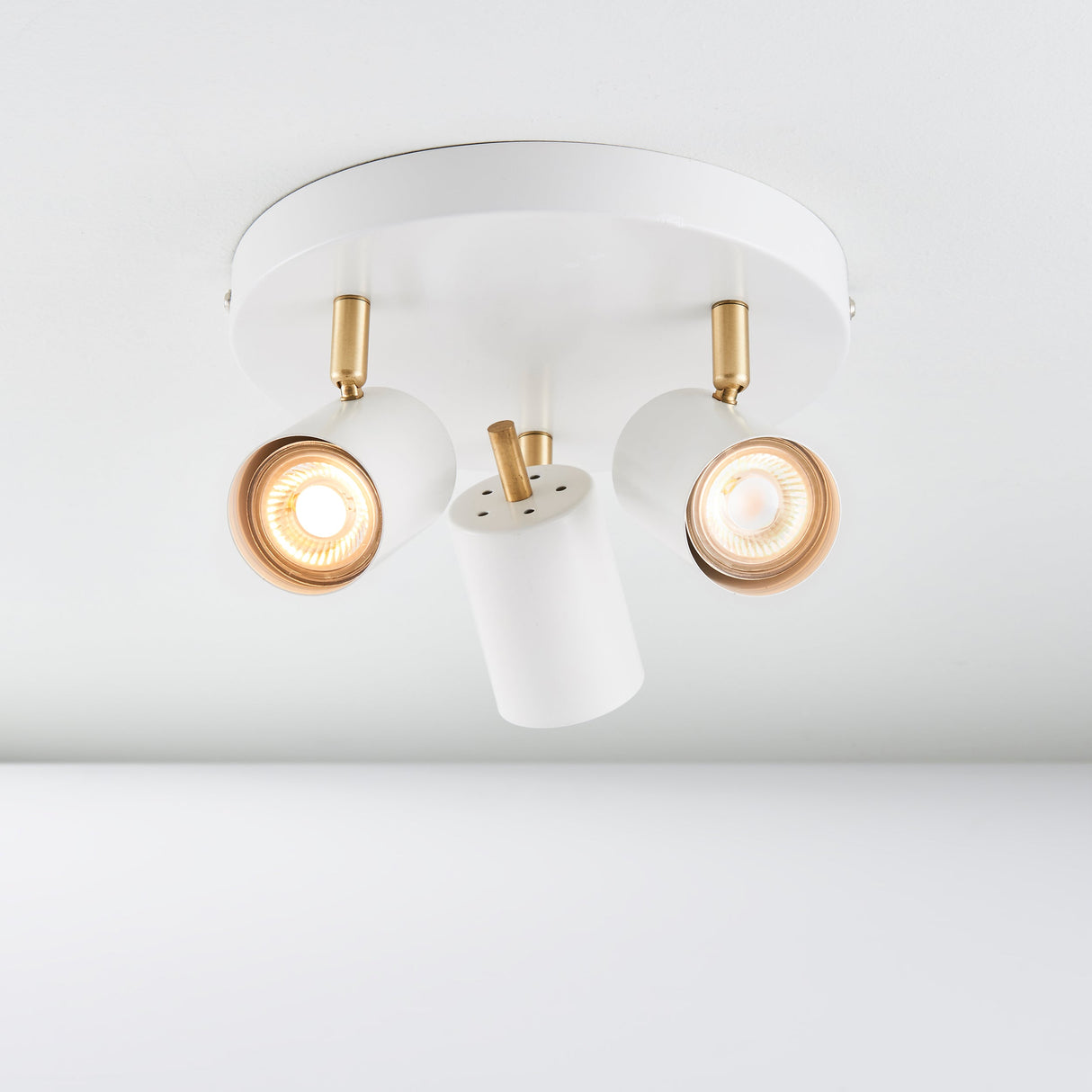 Amos Gull 3 Arm Spotlight Matt White & Satin Brass – from Amos Lighting + Home