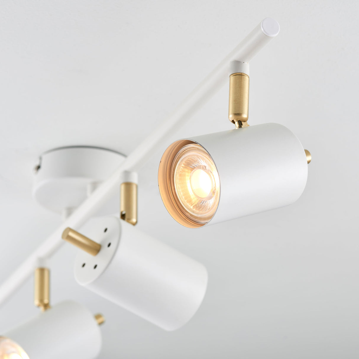 Amos Gull 4 Arm Spotlight Matt White & Satin Brass – from Amos Lighting + Home