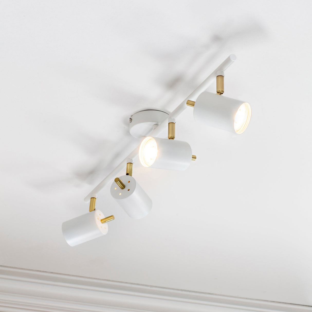 Amos Gull 4 Arm Spotlight Matt White & Satin Brass – from Amos Lighting + Home