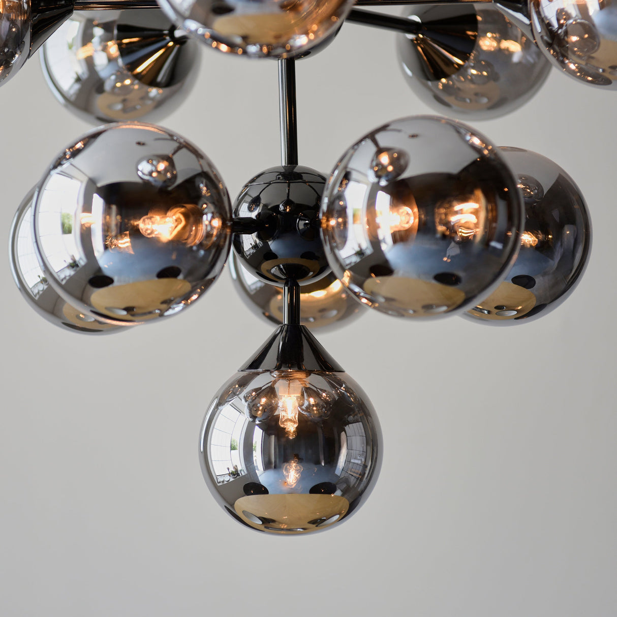Amos Oscar 11lt Modern Chandelier Black Chrome & Smoked Glass – from Amos Lighting + Home