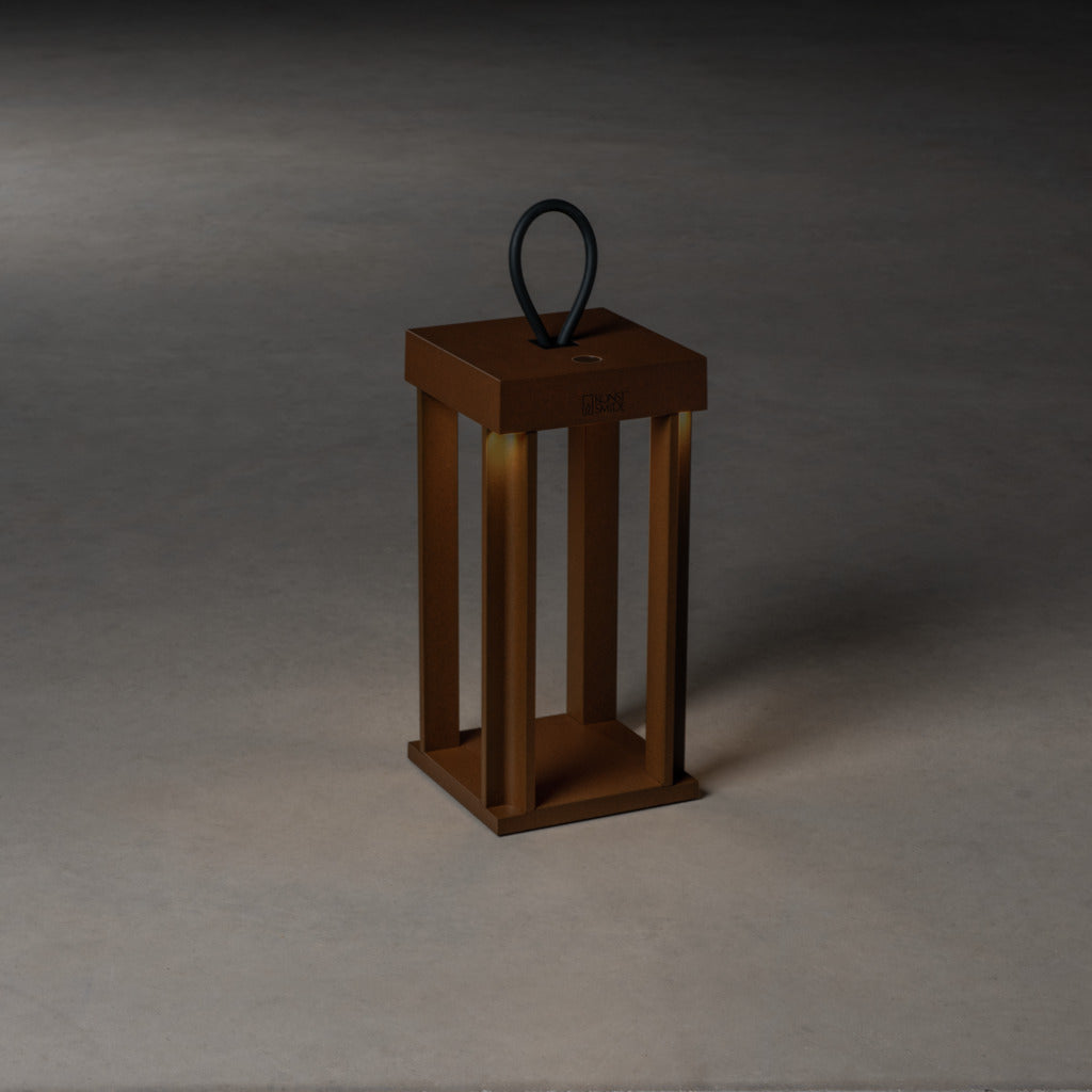 Konstsmide Cannes Outdoor USB Rechargeable Lamp Rust – from Amos Lighting + Home