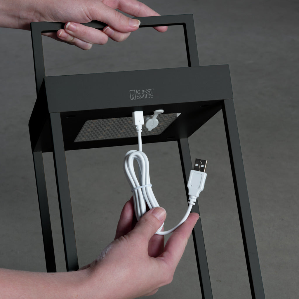 Konstsmide Portofino Outdoor Solar/USB Rechargeable Lamp Black – from Amos Lighting + Home