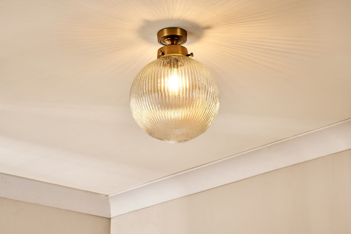 Nkuku Konnie Brass Bathroom Ceiling Lamp Ribbed Glass Globe – from Amos Lighting + Home