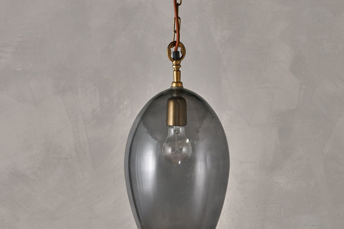 Nkuku Otoro Recycled Smoke Glass Pendant Small Oval – from Amos Lighting + Home