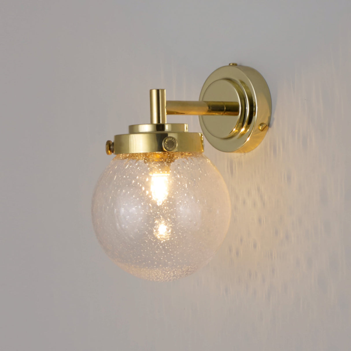 Original BTC Globe Bathroom Wall Light Seedy Glass & Brass IP44 – from Amos Lighting + Home