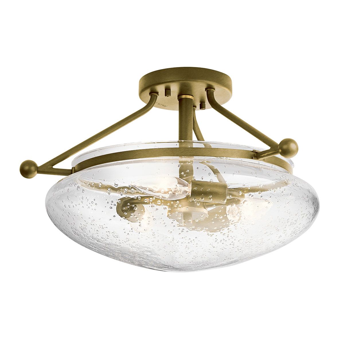 three-light semi flush mount ceiling fixture with seeded glass shade and natural brass finish