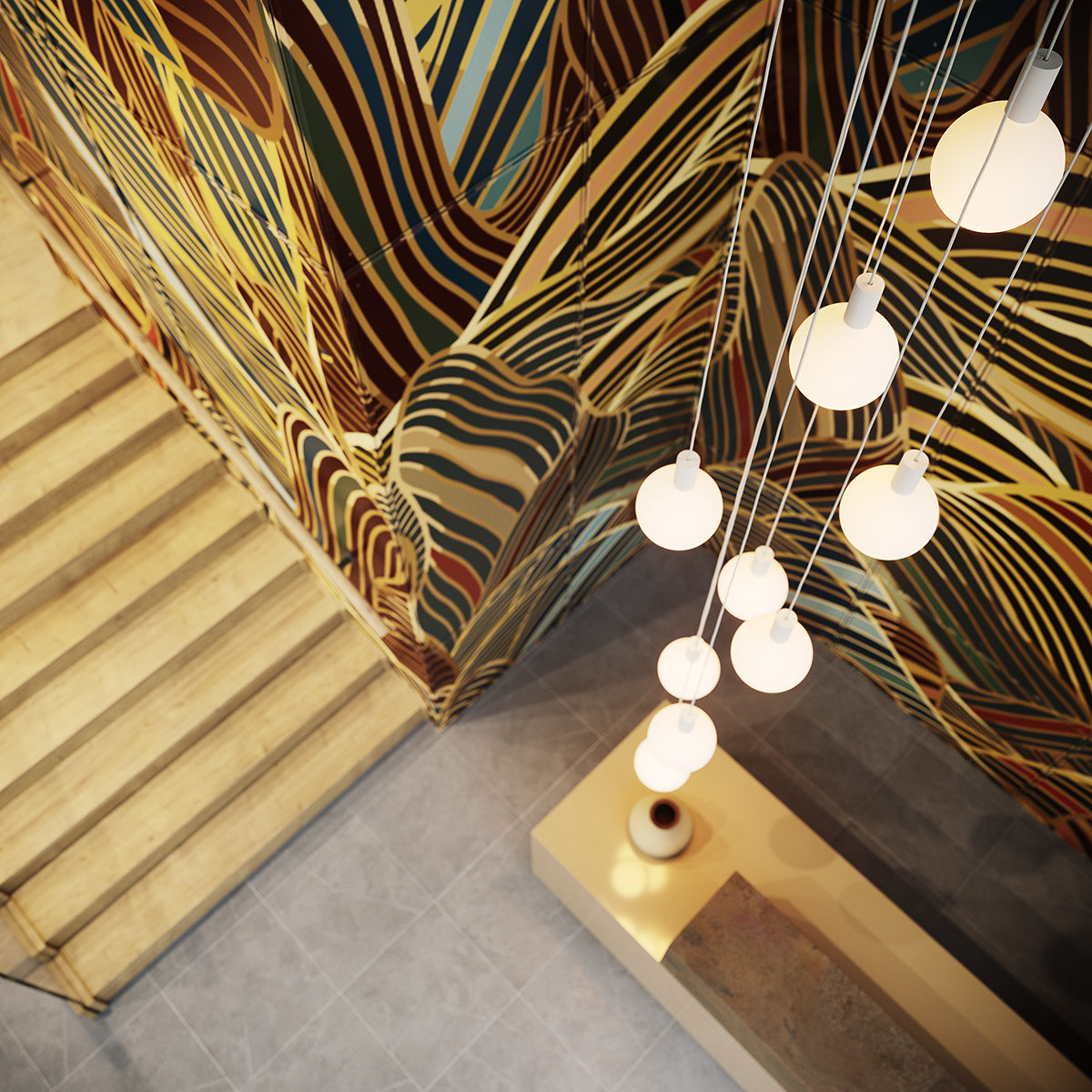 Modern pendant lighting with white spherical bulbs hanging over beige table and colorful abstract wall art