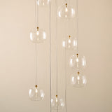 Endon Oslo 12lt Cascade Pendant Brushed aged brass plate & clear glass