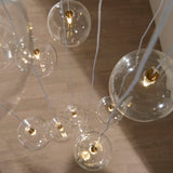 Endon Oslo 12lt Cascade Pendant Brushed aged brass plate & clear glass