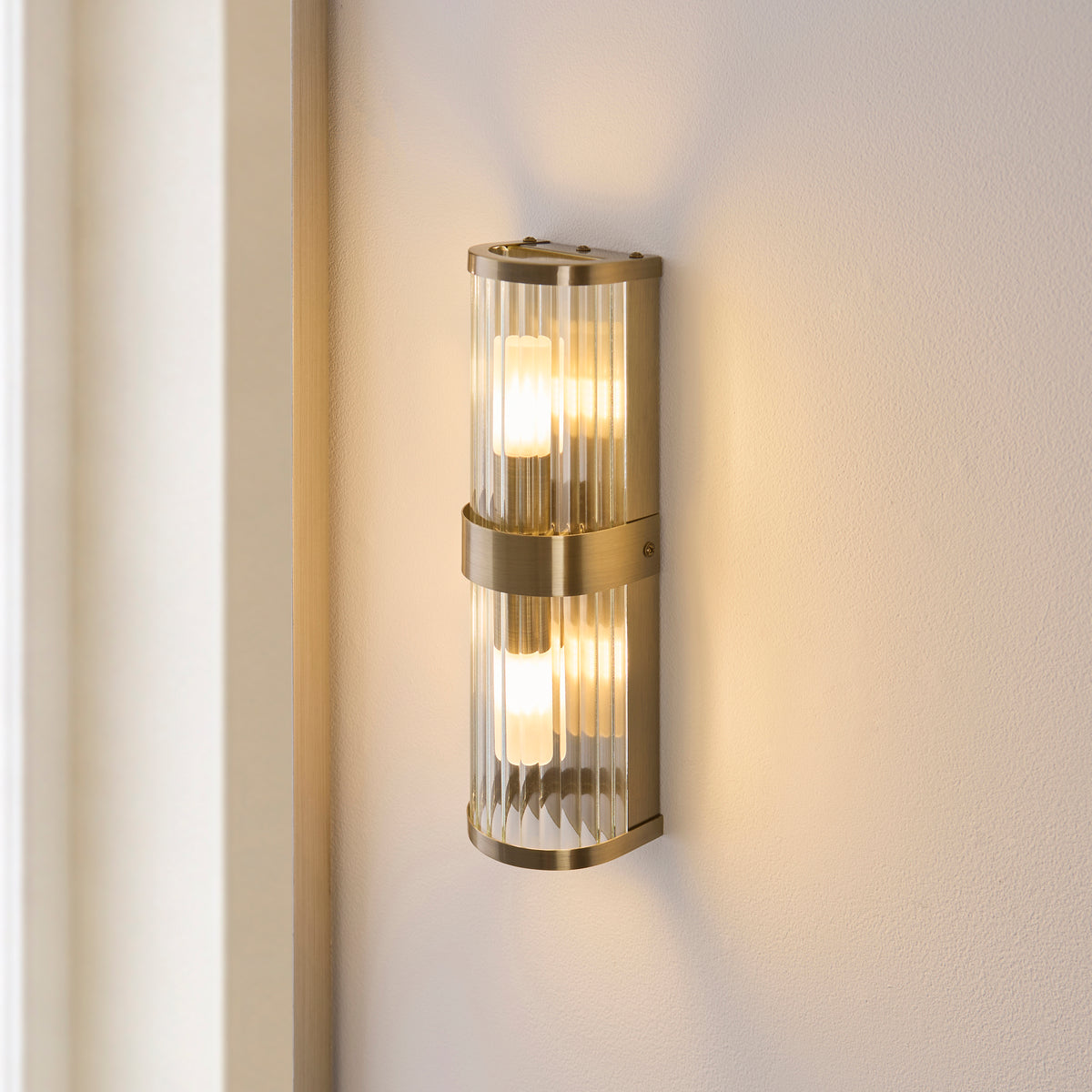 Endon Ridgeton IP44 2lt Wall Antique brass plate & clear ribbed glass