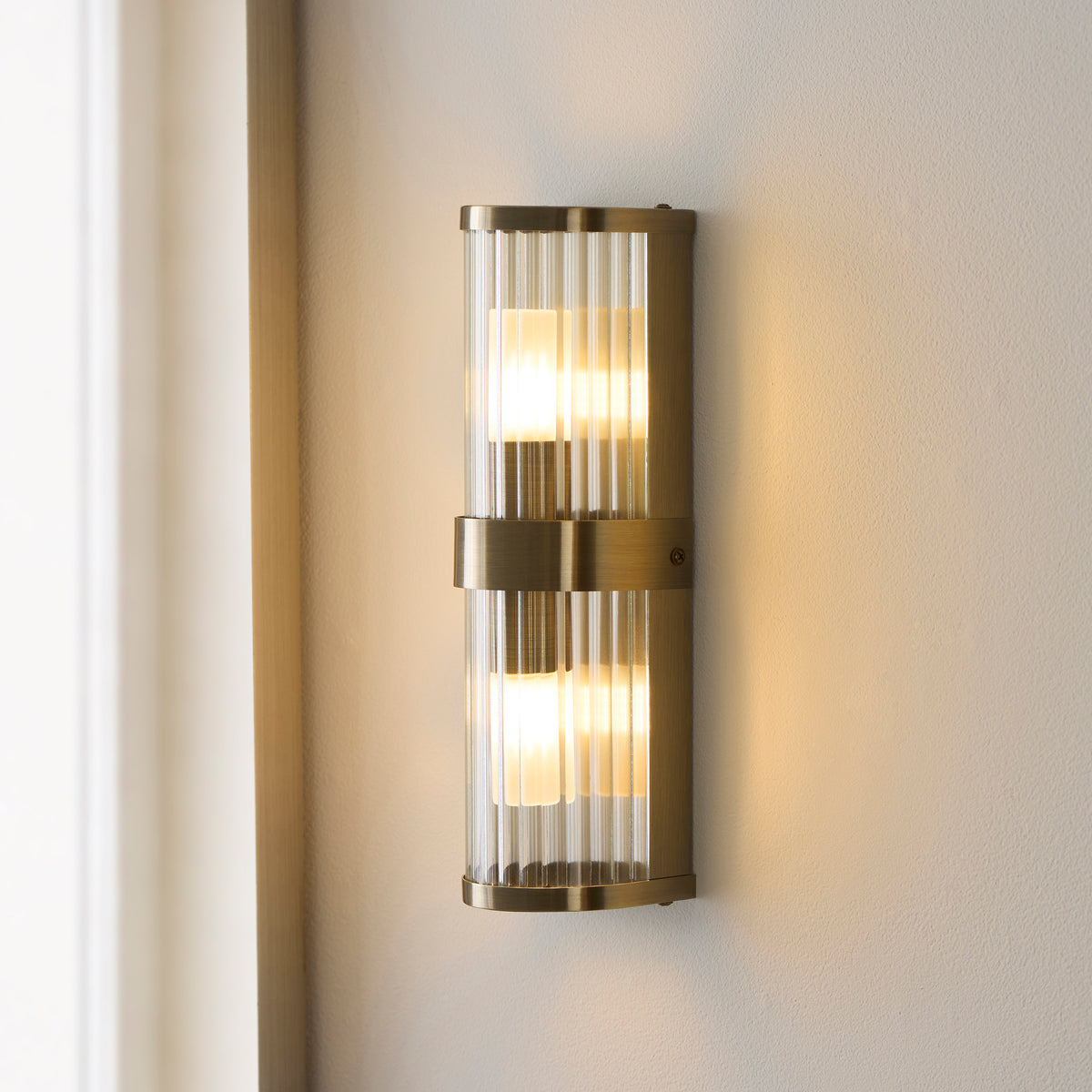 Endon Ridgeton IP44 2lt Wall Antique brass plate & clear ribbed glass
