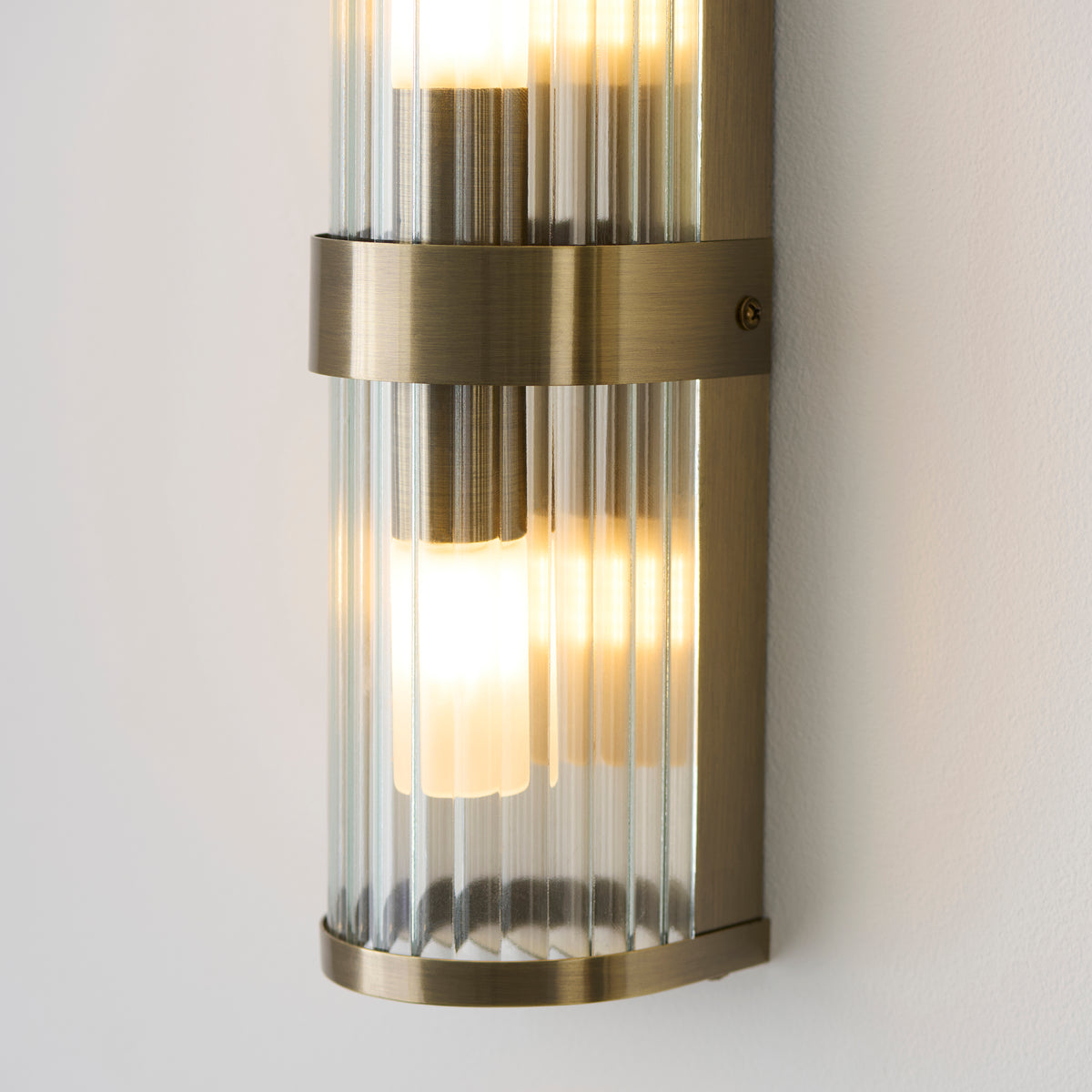 Endon Ridgeton IP44 2lt Wall Antique brass plate & clear ribbed glass