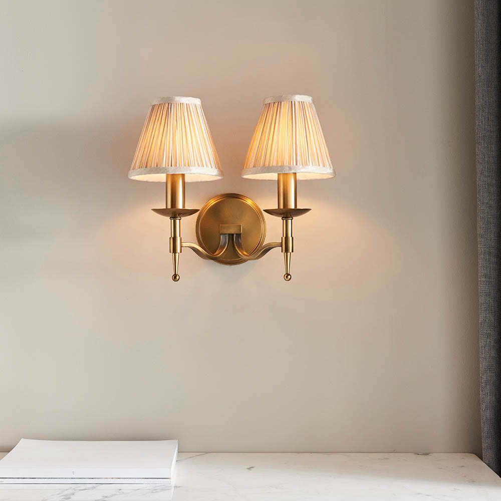 Interiors 1900 Stanford Twin Wall Light Antique Brass with Champagne Shade