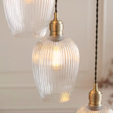 Amos Lucid Antique Brass & Clear Ribbed Glass 7 Light Cascade