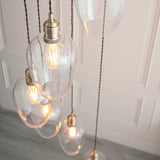 Amos Lucid Antique Brass & Clear Glass 7 Light Cascade