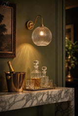 Dar Caliro Wall Light Antique Bronze with Ribbed Glass Globe Shade