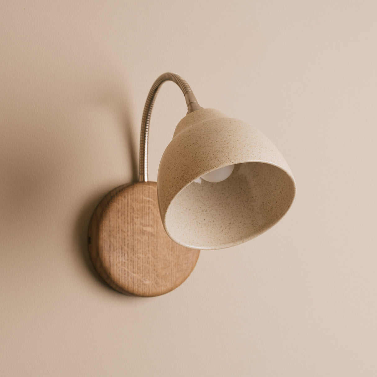Studio Haran Flex Wall Light in Brass/Nickel, Ceramic and Oak