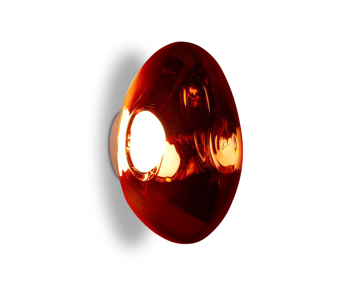Copper Melt Surface 50 LED wall light with a glossy, organic-shaped amber glass shade
