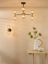 Dar Takara 2 Light Wall Light Matt Black and Bronze With Twisted Amber Glass