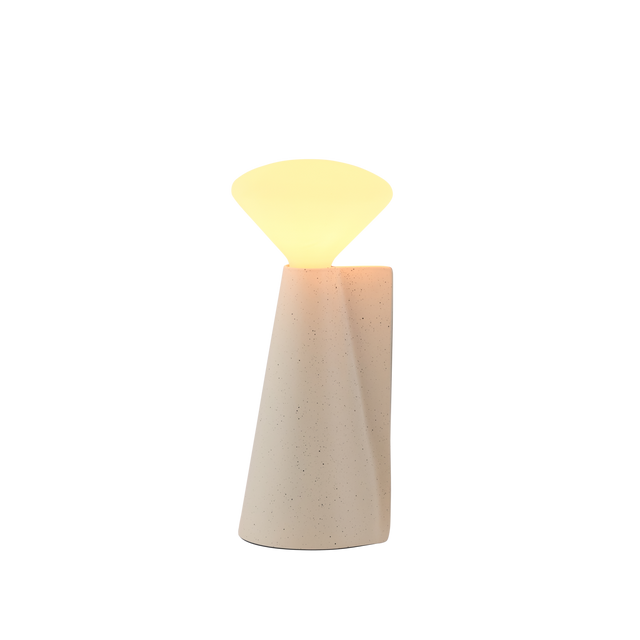Modern Tala Mantle table lamp with textured beige ceramic base and warm glowing fan-shaped light